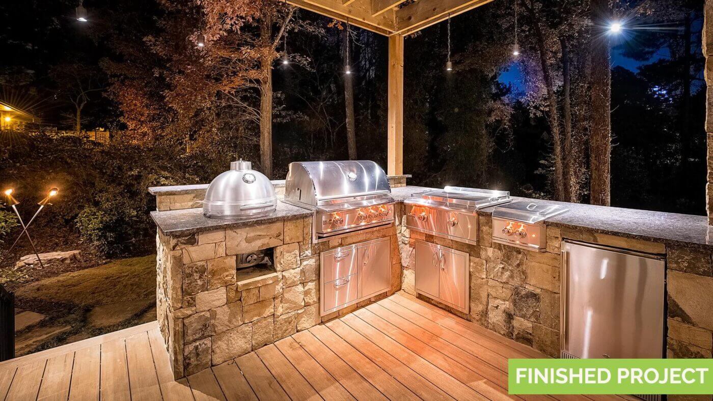 outdoor backyard kitchen with stainless steel appliances