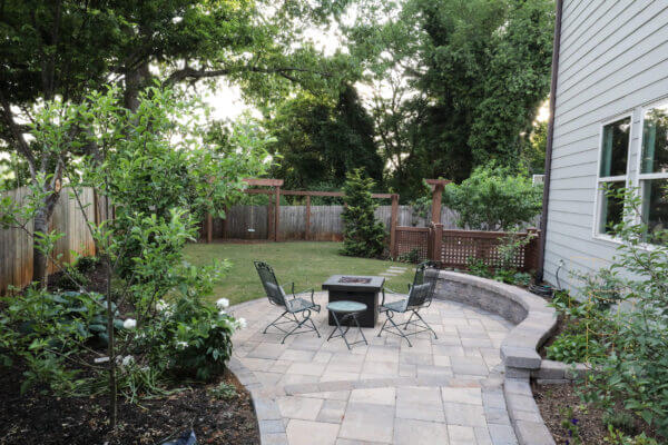 backyard patio with outdoor furniture and hardscaping