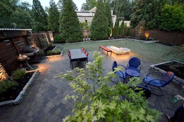 backyard living space with grill